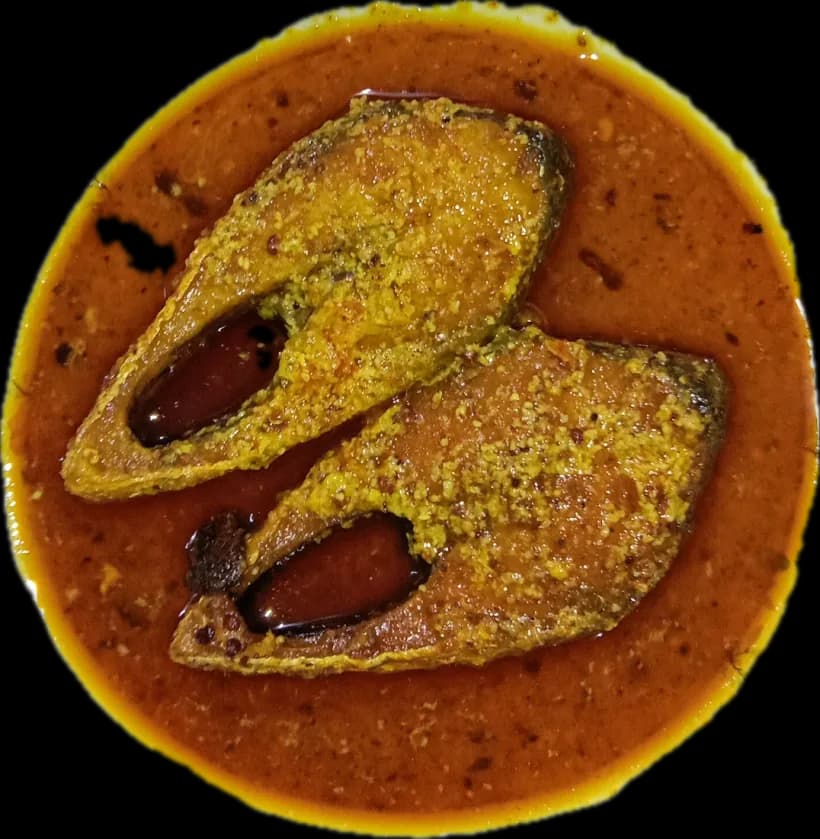 Hilsa steaks in mustard gravy